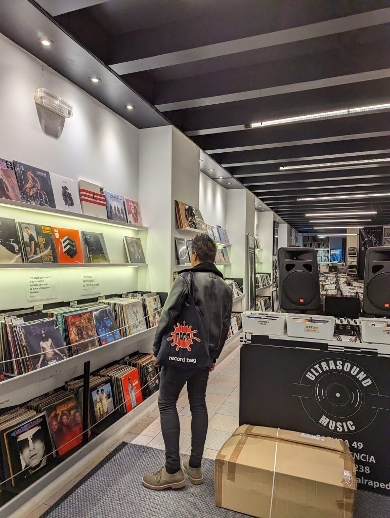 Browsing vinyls at Ultrasound Music in Valencia
